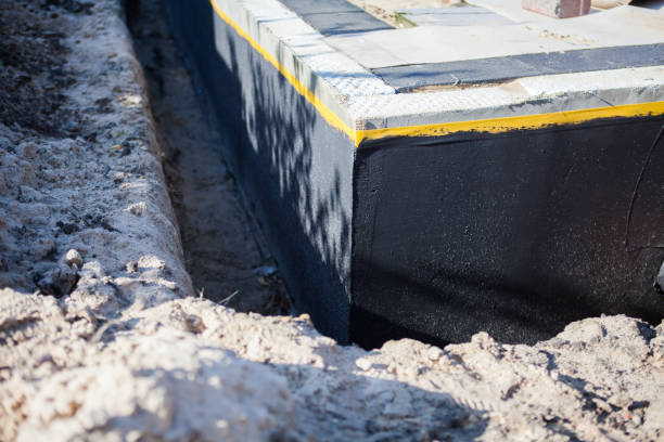 Professional Wet Basement Repair technician working in Bessemer, MI